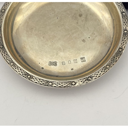 16 - A PAIR OF IRISH – CORK – SILVER CELTIC PIN DISHES, by William Egan, Cork c.1966. Circular form with ... 