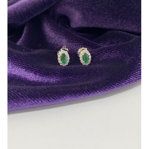 2 - A GORGEOUS PAIR OF 18CT WHITE GOLD EMERALD & DIAMOND CLUSTER STUD EARRINGS, each feature a central o... 