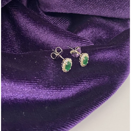 2 - A GORGEOUS PAIR OF 18CT WHITE GOLD EMERALD & DIAMOND CLUSTER STUD EARRINGS, each feature a central o... 