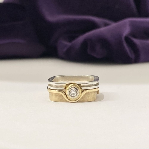 A 9CT GOLD & SILVER DIAMOND STACKING RING SET, BY KERRY RICHARDSON, of ...