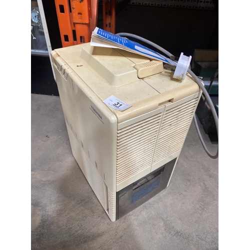 31 - Toshiba RAD-50GDE dehumidifier with manual - working