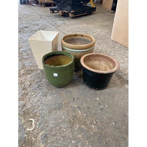 388 - Set of 4 ceramic different plant pots