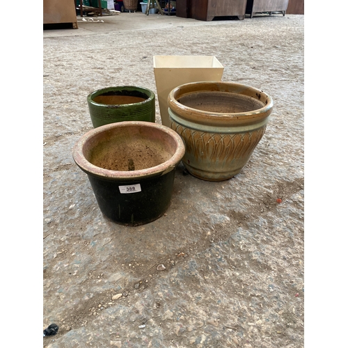 388 - Set of 4 ceramic different plant pots