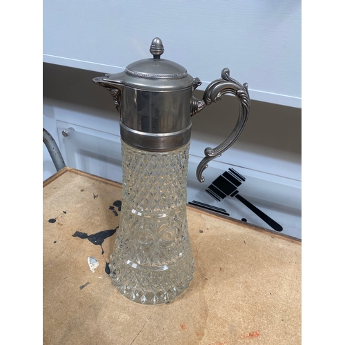 10 - Large cut glass decanter with metal dispenser