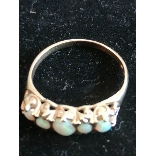 28A - 9ct gold ring set with 5 opals 1.94 grams