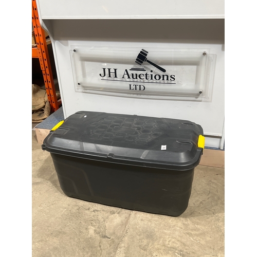 192 - Large plastic heavy duty trunk on wheels