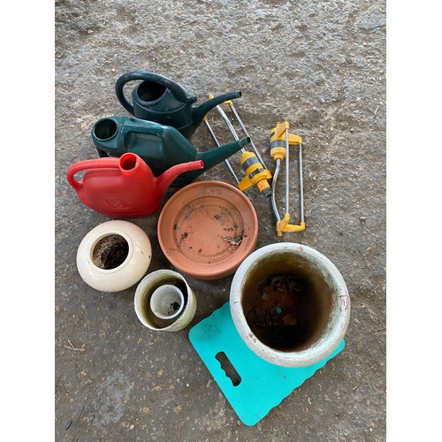 184 - Collection of garden pots, watering cans
