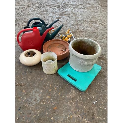 184 - Collection of garden pots, watering cans