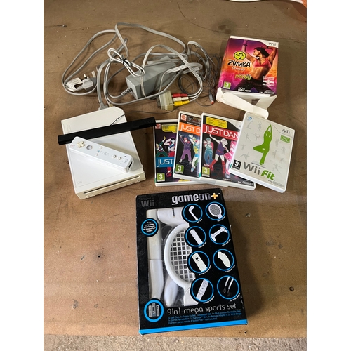 126 - Wii set, includes games, all leads, remote and game on+ set