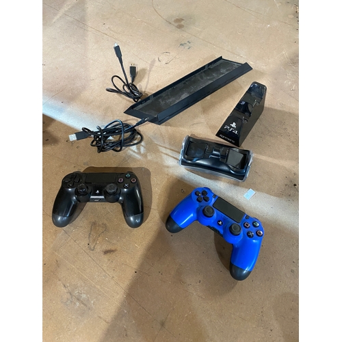 141 - Genuine Playstation 4 controllers and chargers