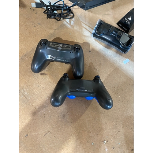 141 - Genuine Playstation 4 controllers and chargers