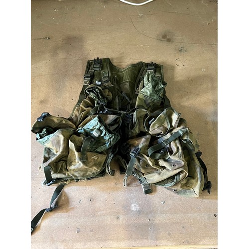 111 - Army camo vest with various  ammo pockets