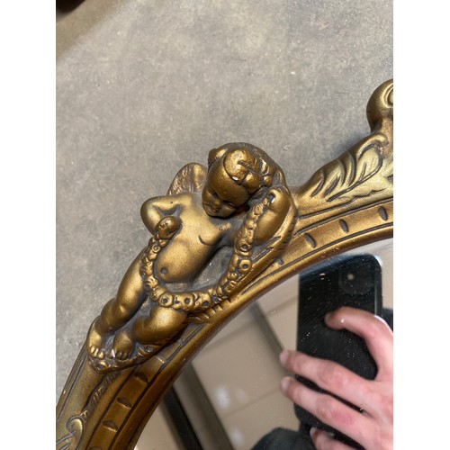 124 - Gold effect cherub mirror