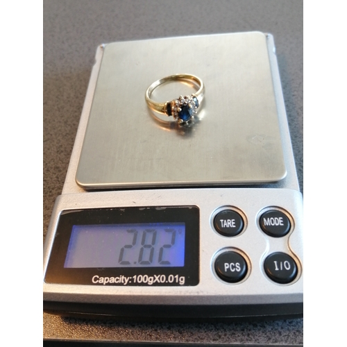 28A - 9ct gold ring set with sapphire and diamonds size Q 2.82 grams