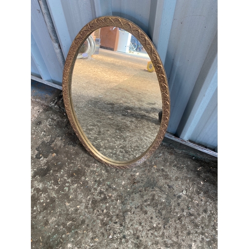 137 - Oval decorative mirror