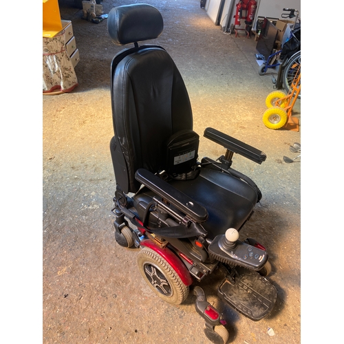 214 - Electric wheelchair - 4mph - with charger - some wear but working order