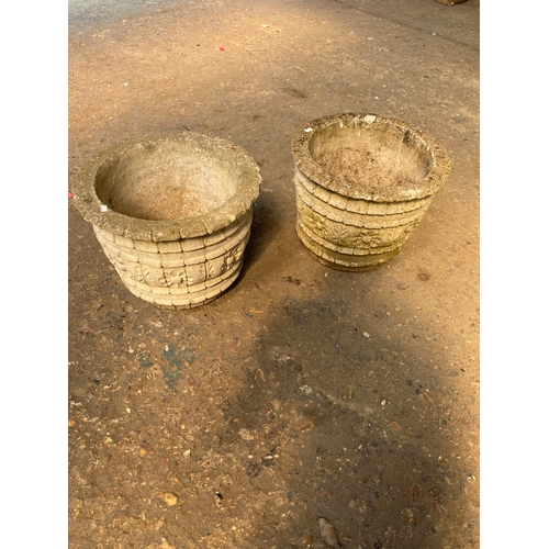 376 - Pair of decorative heavy stone garden planters