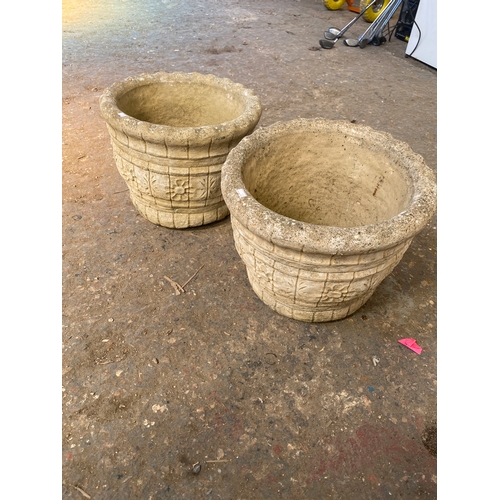 28 - Pair of stone decorative garden planters