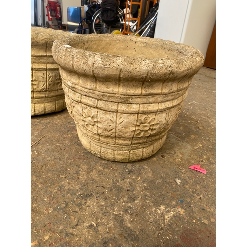 28 - Pair of stone decorative garden planters