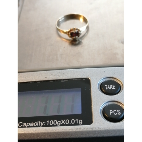 28A - 9ct gold ring set with red gemstone Size M 1.10 grams