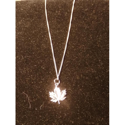 23A - Silver necklace with Canadian maple leaf pendant 5.0 grams