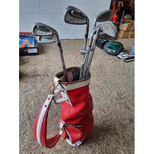 433 - Set of golf clubs and bag