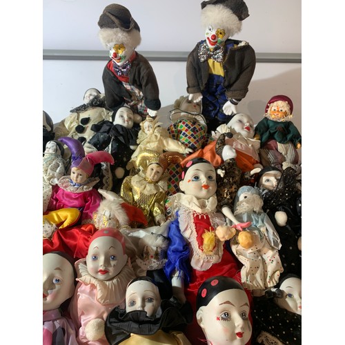 45 - Large quantity of dolls - mainly clowns with ceramic faces