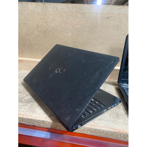 210 - Fujitsu A555 laptop, i5-5th CPU, 8GB RAM, 240GB SSD - windows 10 installed - with charger