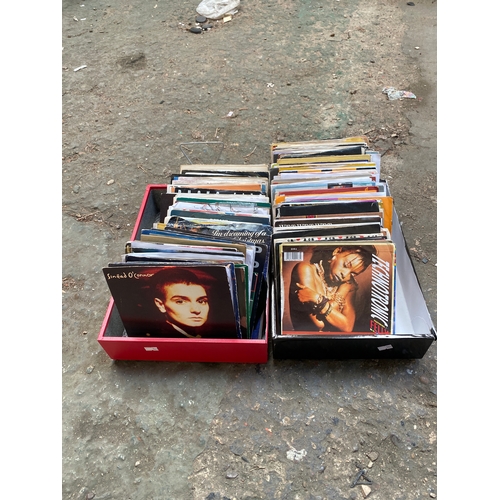 235 - 2x boxes of vinyl singles inc Sinead O’Connor