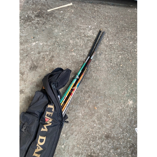 436 - Fishing rod case with various poles