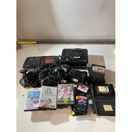 304 - 2x Sega Mega Drive consoles - 1x Master System Console - with lots of games inc Fire & Forget, Sonic... 