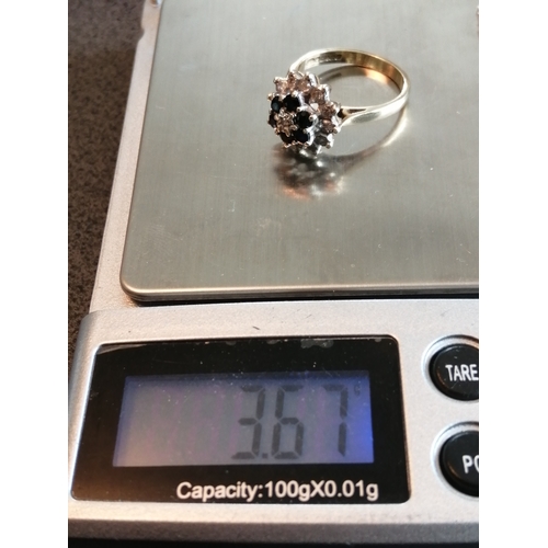 29A - 9ct gold diamond and sapphire cluster ring 3.67 grams Size O