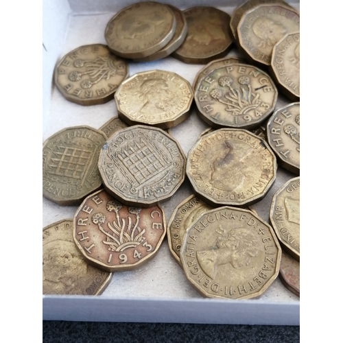 30A - Box of approximately 60 brass threepenny bits