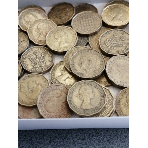 30A - Box of approximately 60 brass threepenny bits