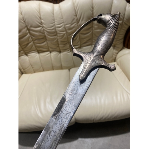 13 - ‘Hand made in India’ decorative sword with sleeve