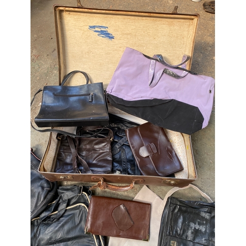 264 - Vintage trunk with quantity of leather bags & purses