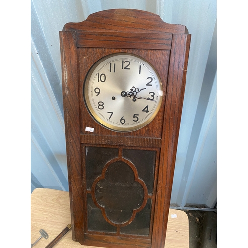 39 - English made brass movement wall clock with pendulum & key