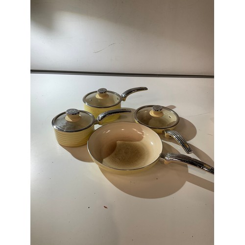 95 - cream pan set including 2 sauce pans and frying pans