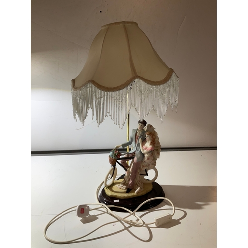 26 - Decorative tall (70cm) lamp depicting a couple on a bicycle