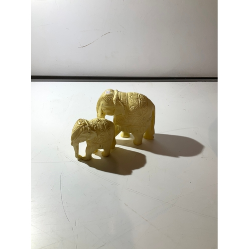 41 - Pair of wooden painted elephants