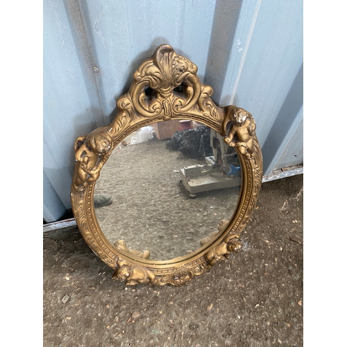 159 - Gold gilted cherub decorative mirror