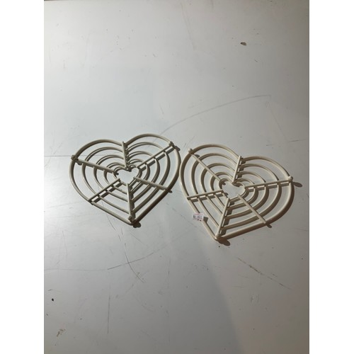 152 - 2 two metal heart shaped trivets