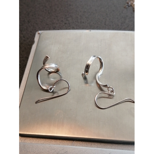 21A - Silver earrings with swirl design 1.37 grams