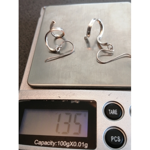 21A - Silver earrings with swirl design 1.37 grams