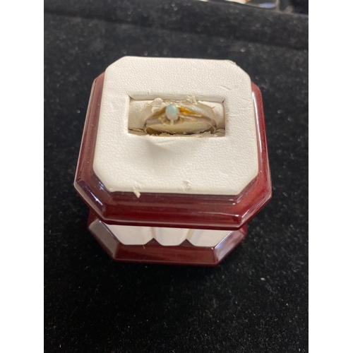 42B - Gold (believed to be 9ct but not stamped) ring with opal - inscribed 31st July 1890 - 1.26g