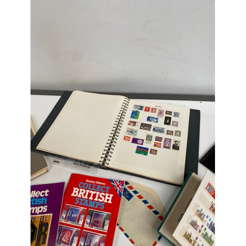 315 - Large quantity of stamp albums & collectors annuals