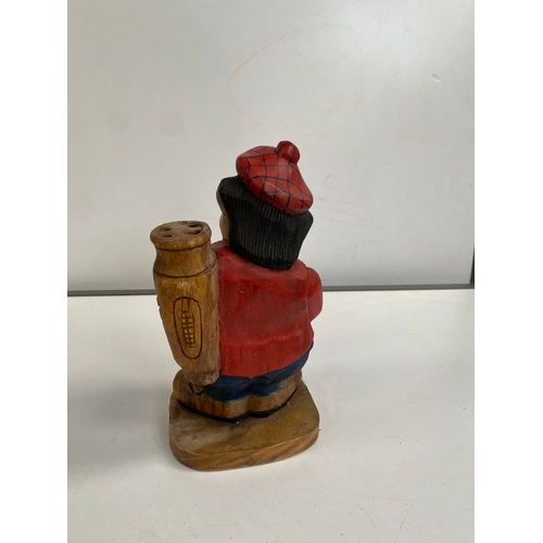 201 - Wooden carved golfing figure