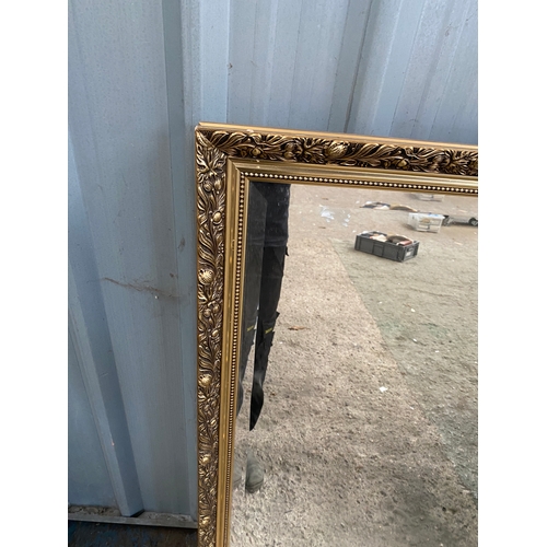 400 - Large (130x95cm) gold gilted decorative bevelled edge mirror