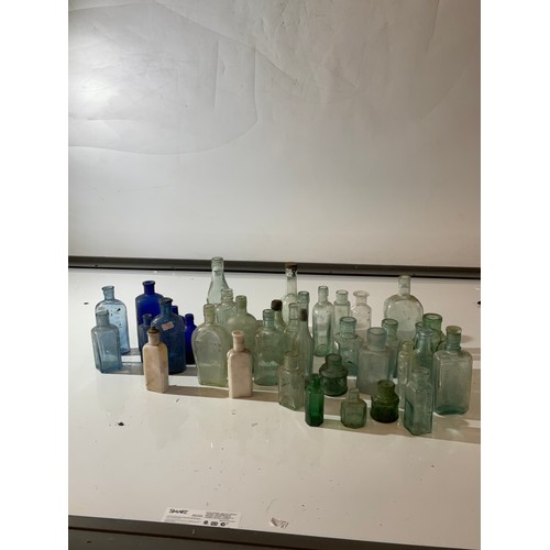 477 - Large collection of vintage bottles poison bottles some have wording