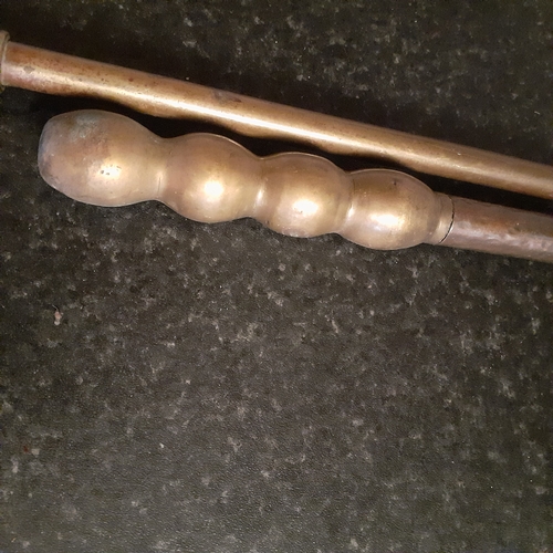 4 - 2 x heavy solid brass pokers. Longest over 2 ft. Combined weight approx 1.2kg